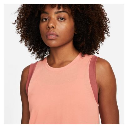 Camiseta sin mangas rosa Nike Yoga Dri-Fit para mujer