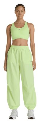 New Balance Essential Run sportbeha geel dames